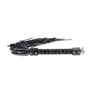 Decorative leather flogger on white background